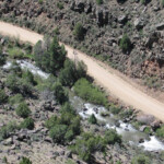 Rio Hondo Rushing Spring Water Heading For The Rio Grande